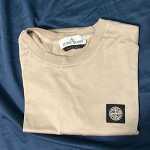 Beige stone island T shirt